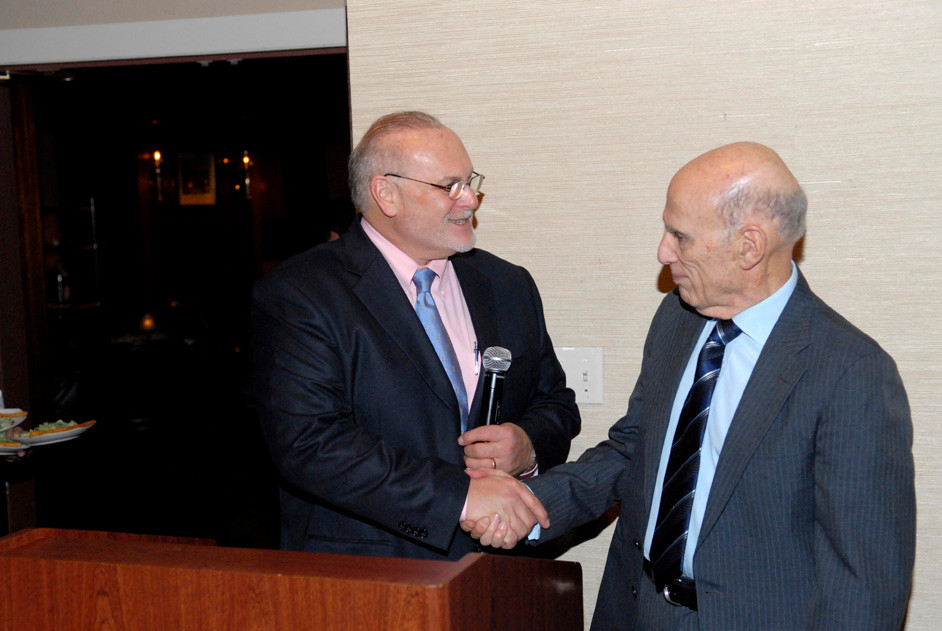 Dr. John Santopolo, left, and Joseph Gelb formally announced the merger of the Woodmere Merchants Association and the Hewlett Business Association that formed the Hewlett-Woodmere Business Association at a dinner at the Woodmere Club on Nov. 10, 2011.