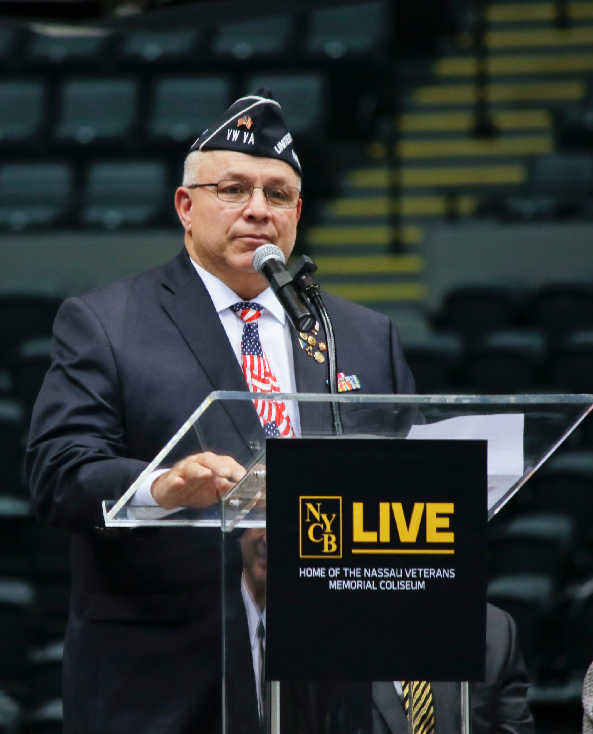 Frank Colon spoke about the new veterans memorial for the venue, which kept the name Nassau Veterans Memorial Coliseum, and recognized the veterans who were in attendance. The new coliseum has 8 seats that will always remain empty during every event in honor of those who have given the ultimate sacrifice. POW, MIA, all brances of the military, first responders and those who lost their lives in 9-11. These seats are marked with a special emblem.